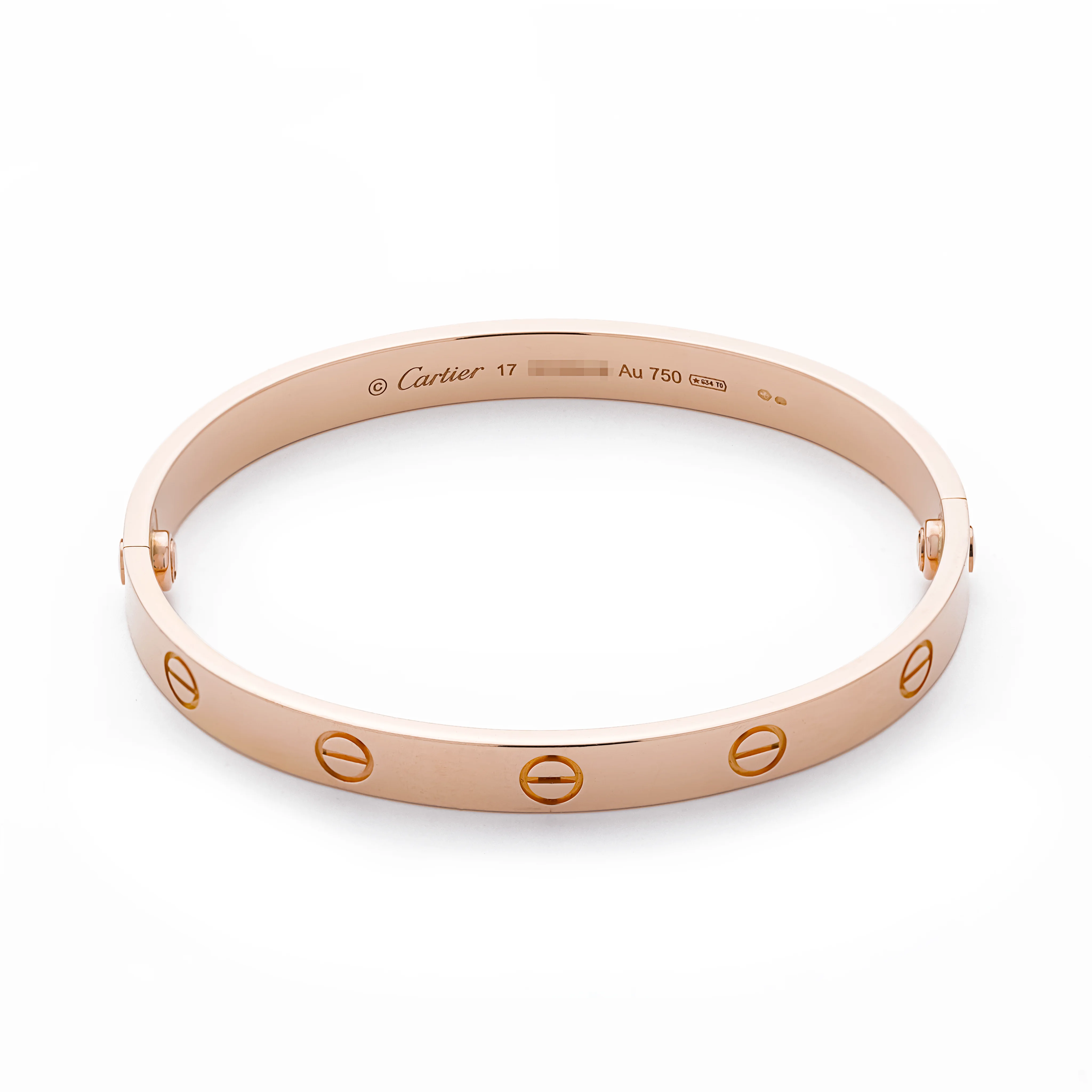 Cartier Love bracelet in 18k rose gold, showing the signature screw motifs and "Cartier 17 Au 750" engraving, on a white background.